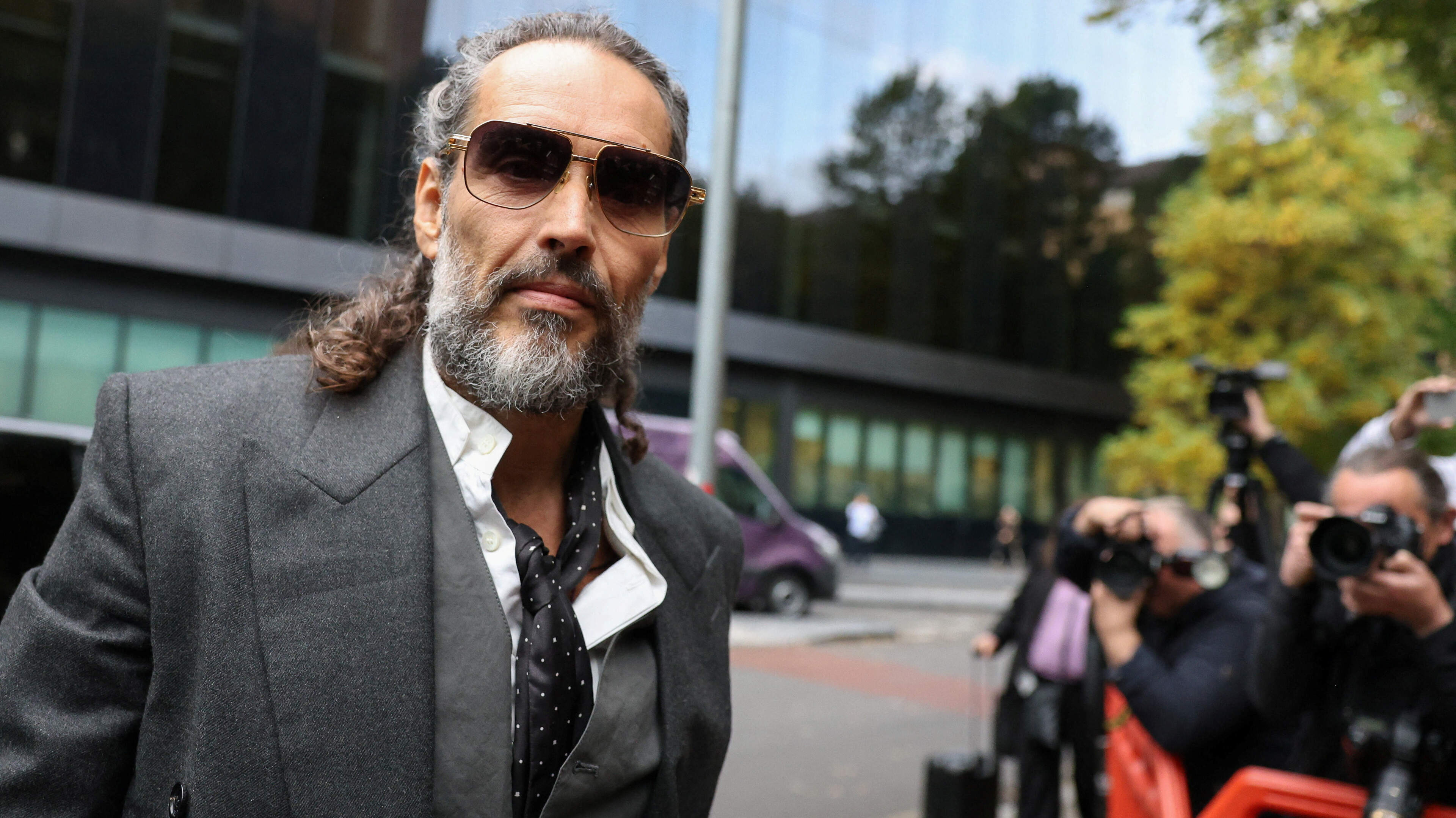 Russell Brand’s first accuser ‘feared she may be pregnant after hotel attack’